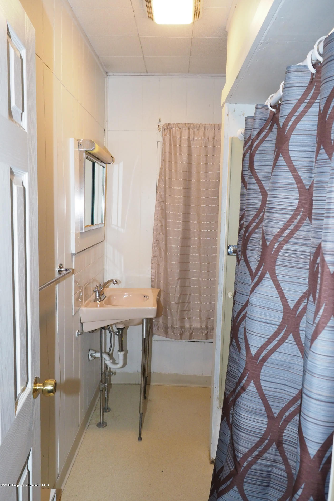 824 Green Ridge Street Scranton, PA 18509 - Photo 10 of 17 a view of a bedroom with a table and chairs