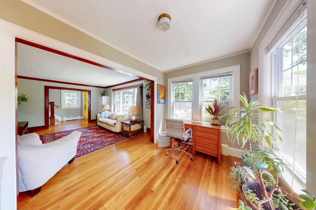 29 Hutchins Road Medford, MA 02155 - Photo 13 of 34 a living room with furniture and a large window