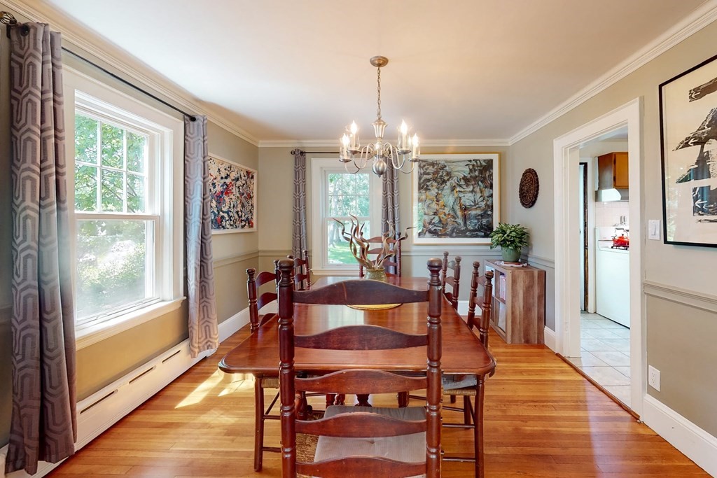 29 Hutchins Road Medford, MA 02155 - Photo 14 of 34 a view of a dining room with furniture window and wooden floor
