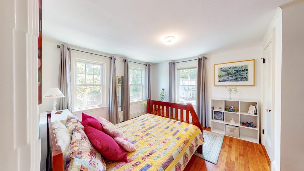 29 Hutchins Road Medford, MA 02155 - Photo 22 of 34 a bedroom with a bed and a large window