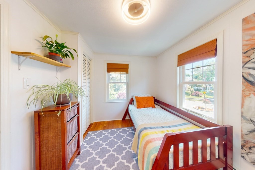 29 Hutchins Road Medford, MA 02155 - Photo 25 of 34 a bedroom with a bed and a window