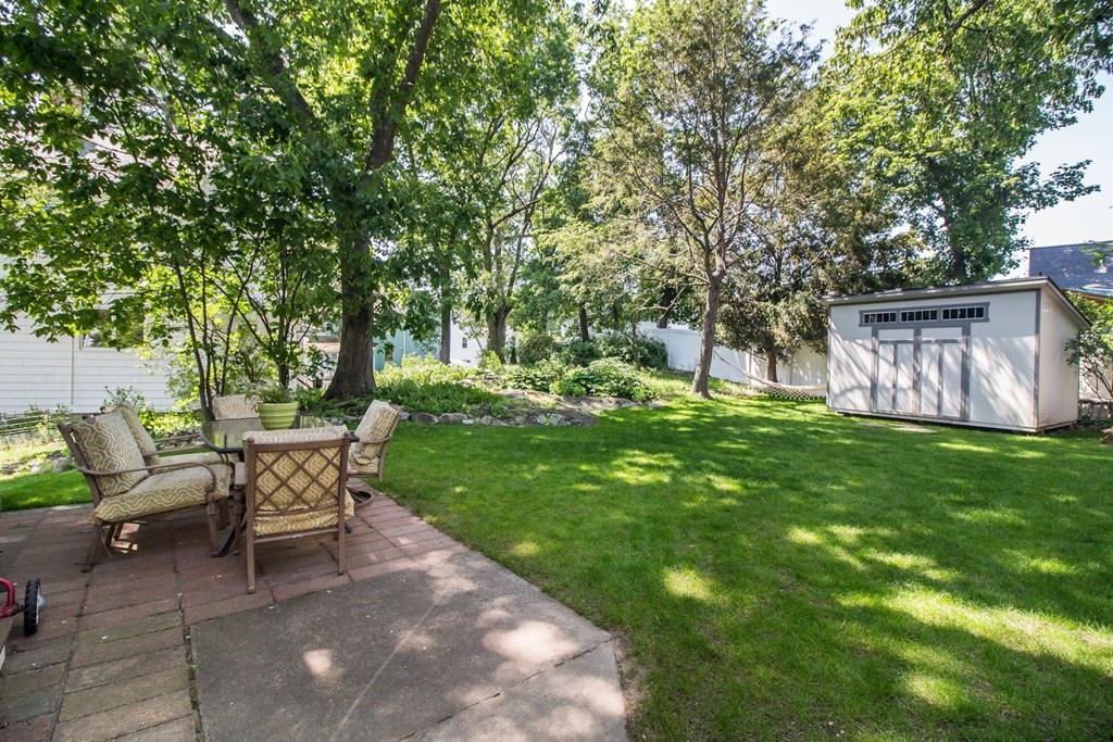 29 Hutchins Road Medford, MA 02155 - Photo 30 of 34 a view of a backyard with sitting area
