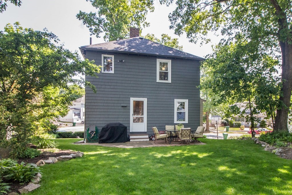 29 Hutchins Road Medford, MA 02155 - Photo 34 of 34 a backyard of a house with seating space