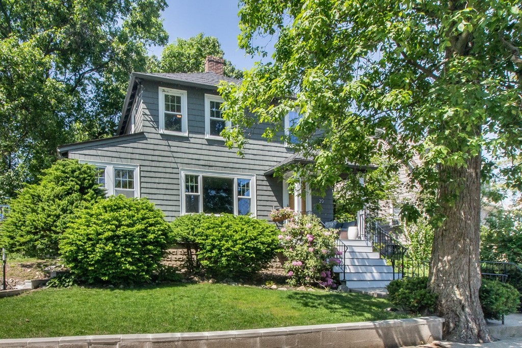 29 Hutchins Road Medford, MA 02155 - Photo 4 of 34 a house that has a tree in front of the house