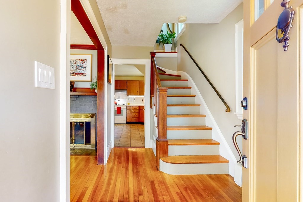 29 Hutchins Road Medford, MA 02155 - Photo 6 of 34 a view of entryway and hall with wooden floor