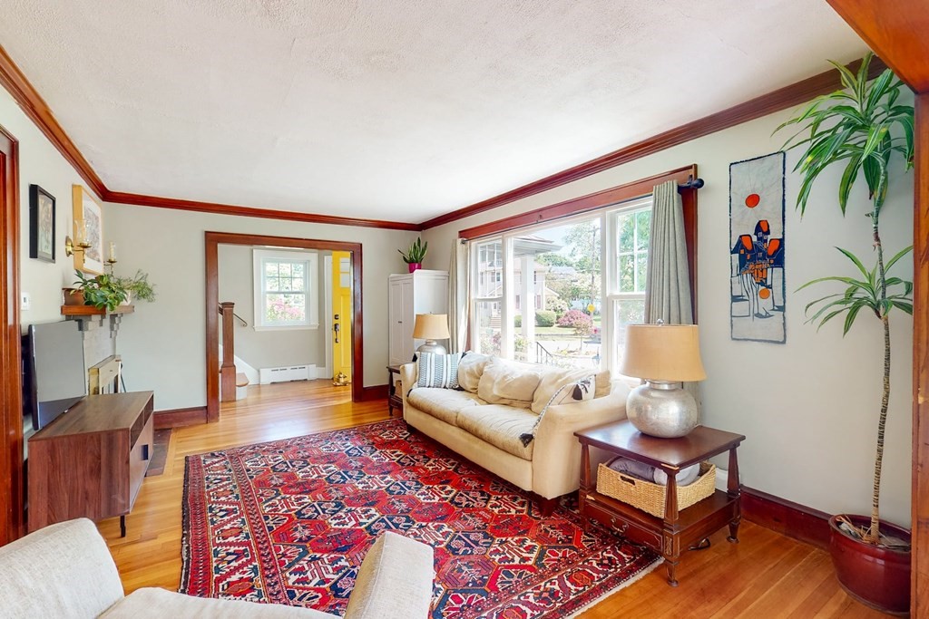 29 Hutchins Road Medford, MA 02155 - Photo 10 of 34 a living room with furniture and a large window
