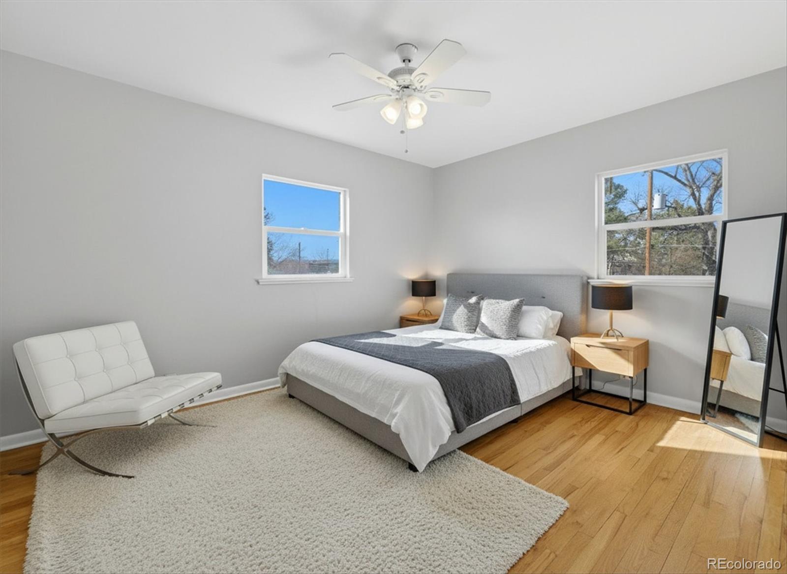 2053 Quitman Street Denver, CO 80212 - Photo 23 of 39 a bed room with a bed and a couch