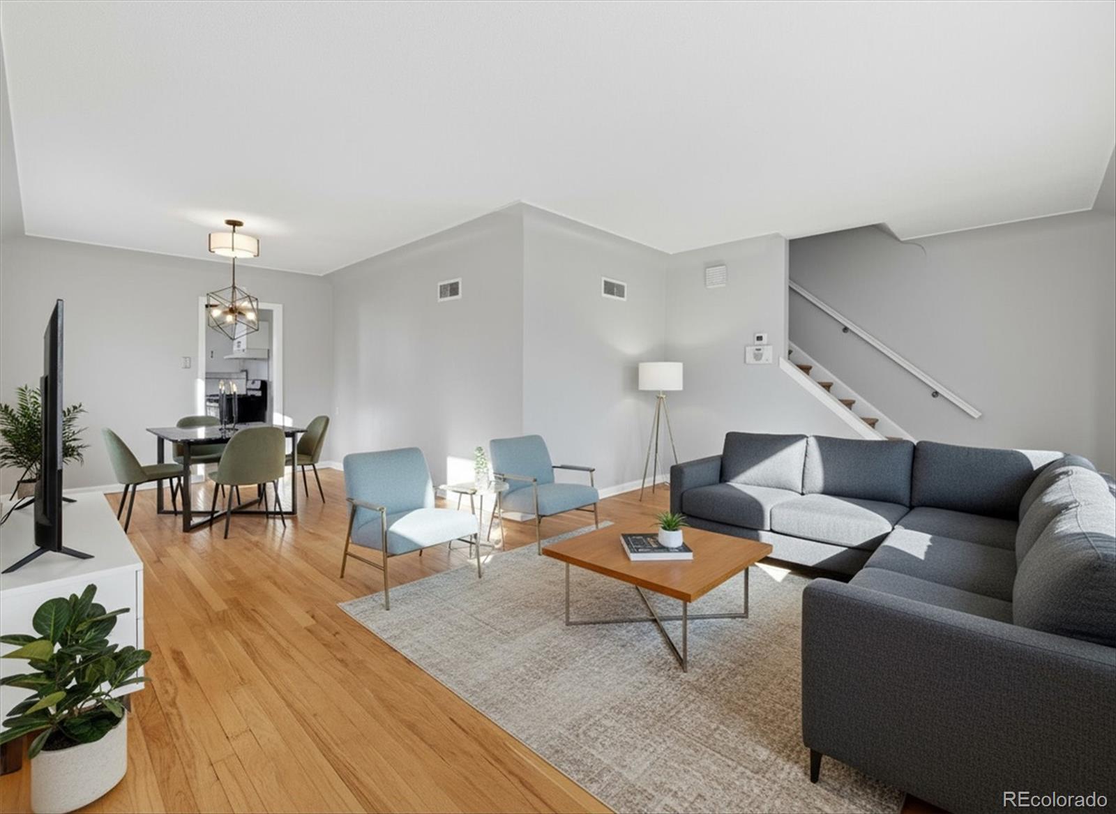 2053 Quitman Street Denver, CO 80212 - Photo 7 of 39 a living room with furniture and wooden floor