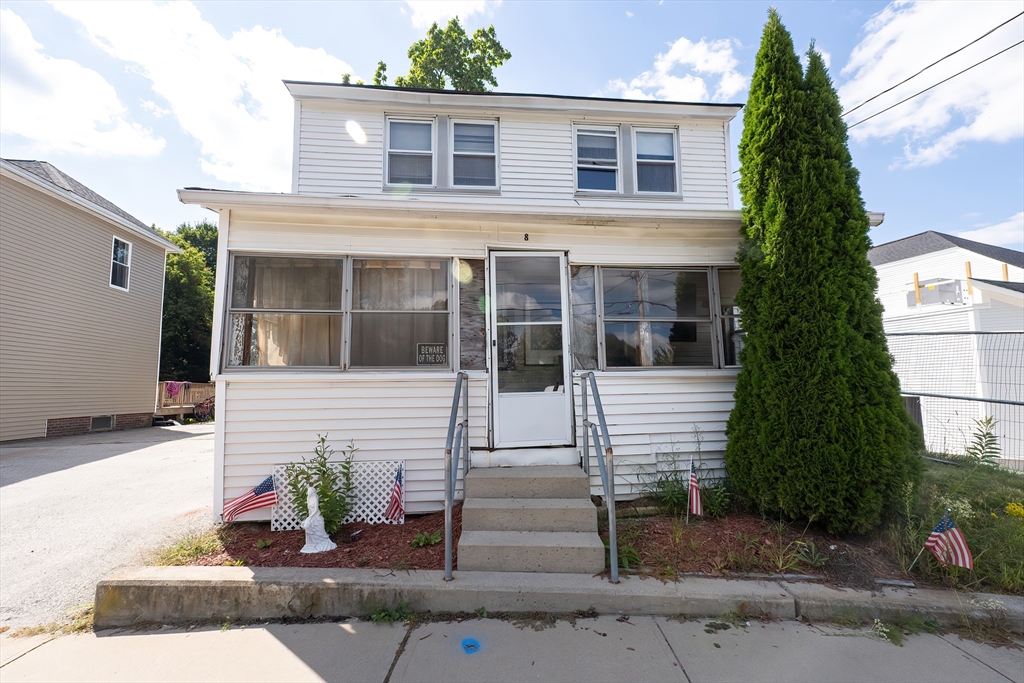8 Thompson Road Webster, MA 01570 - Photo 1 of 24 a front view of a house with garden