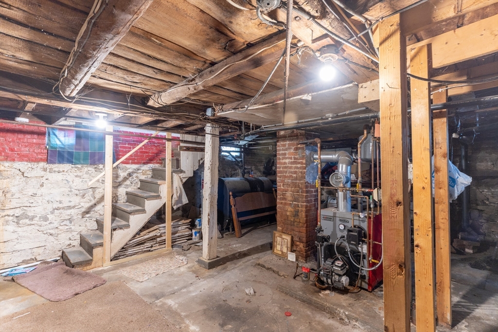 8 Thompson Road Webster, MA 01570 - Photo 18 of 24 a view of a storage room with racks