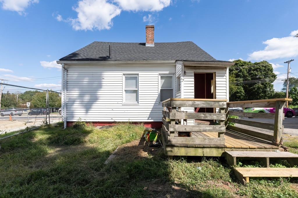 8 Thompson Road Webster, MA 01570 - Photo 19 of 24 a front view of a house with a yard