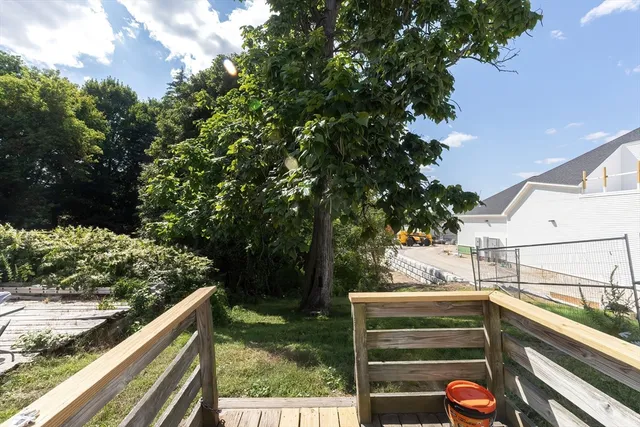a view of a house in a yard