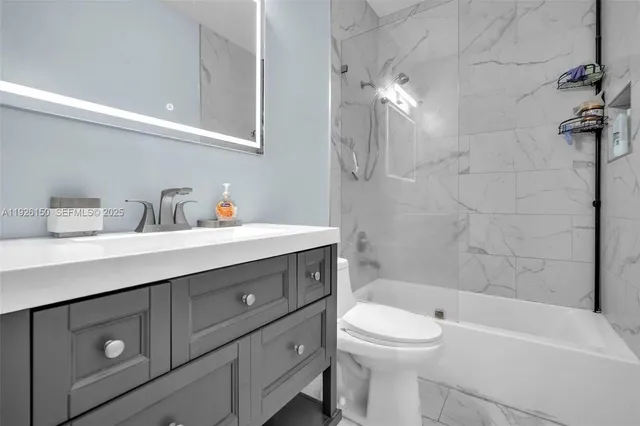 a view of hallway with wooden floor