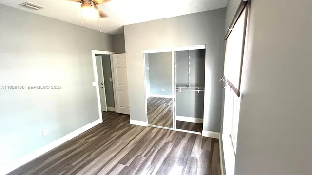 a view of a patio with a table chairs and a table