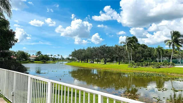 a view of a sign board with a big yard