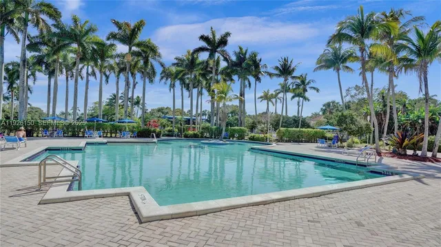 a view of a backyard with a patio