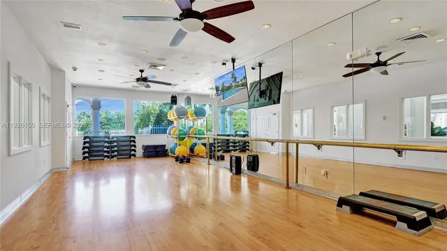 a room with dining table and chairs