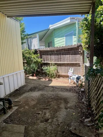 a view of a porch with furniture