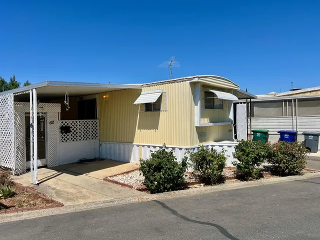 a front view of a house with a garage