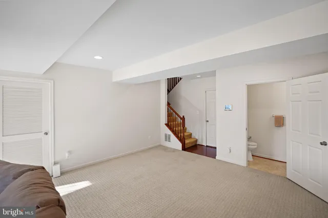 a view of a livingroom with a staircase