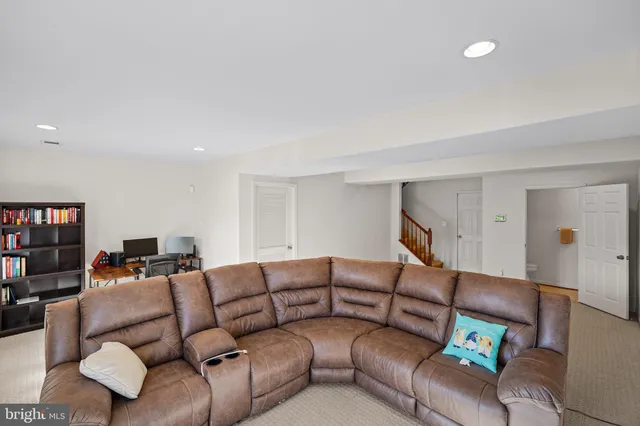 a living room with furniture and a couch