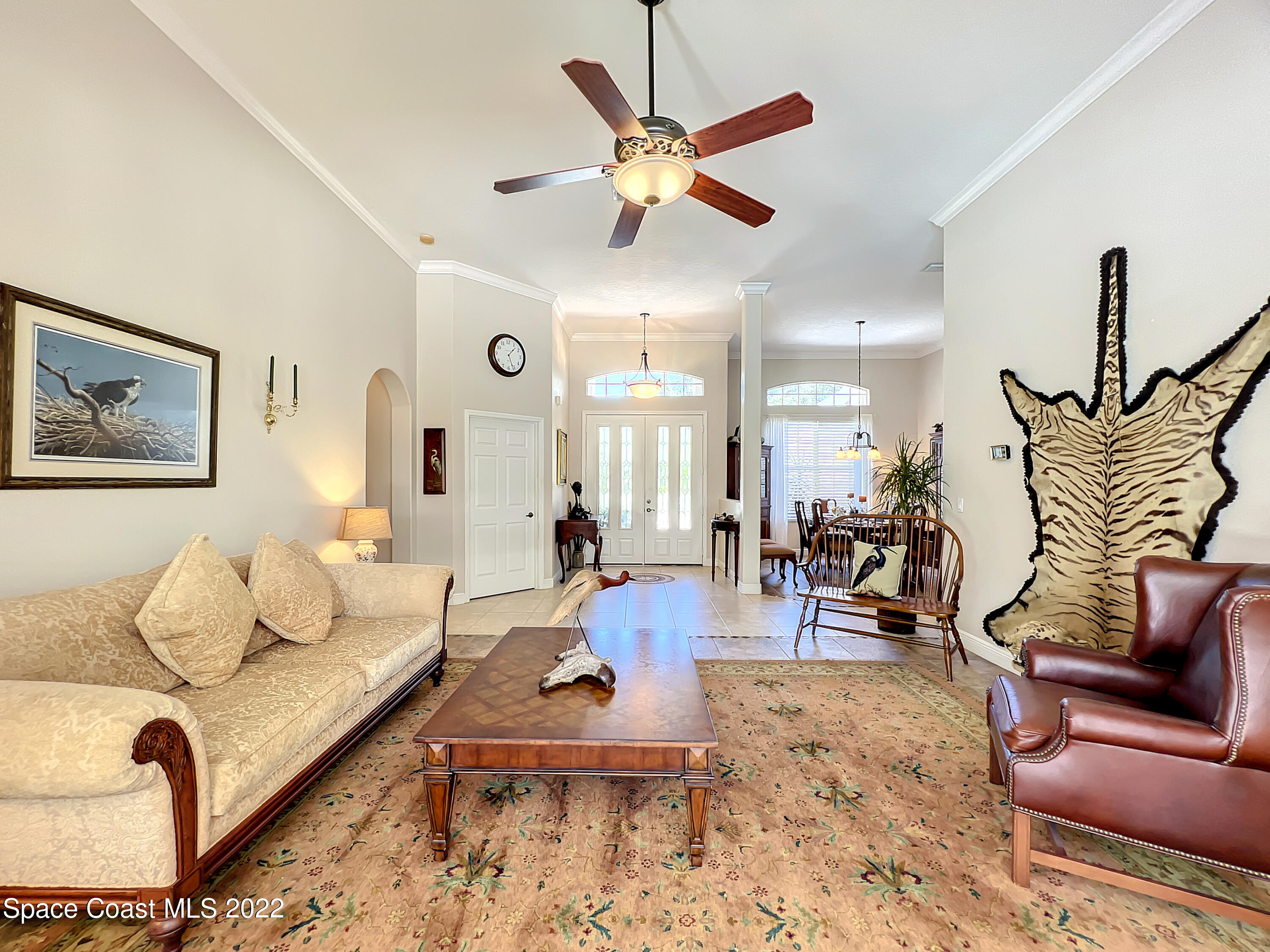 1705 Winding Ridge Circle Southeast Palm Bay, FL 32909 - Photo 8 of 45 a living room with furniture
