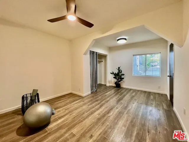 a view of a livingroom with wooden floor