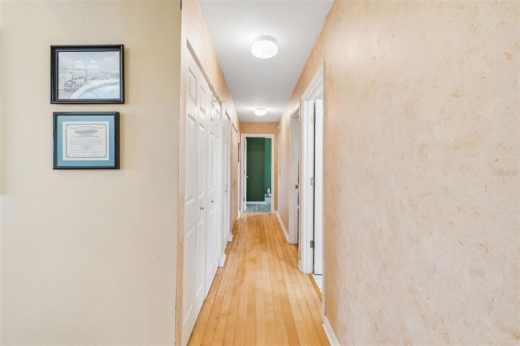 119 Burns Road Terra Ceia, FL 34250 - Photo 53 of 100 a view of a hallway with wooden floor and closet