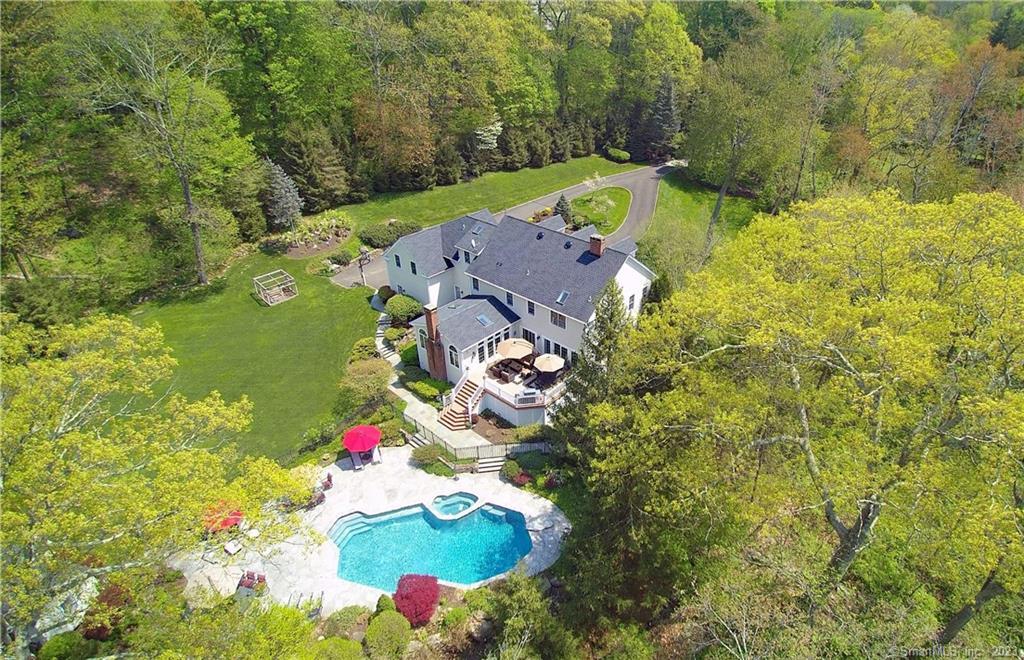 90 Pumping Station Road Ridgefield, CT 06877 - Photo 1 of 1 an aerial view of a house with a yard