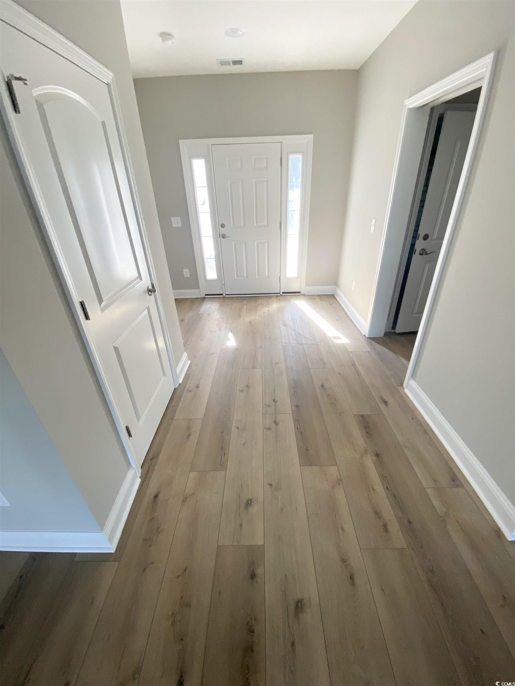 348 Jay Street Murrells Inlet, SC 29576 - Photo 14 of 29 Entrance foyer featuring light hardwood / wood-sty