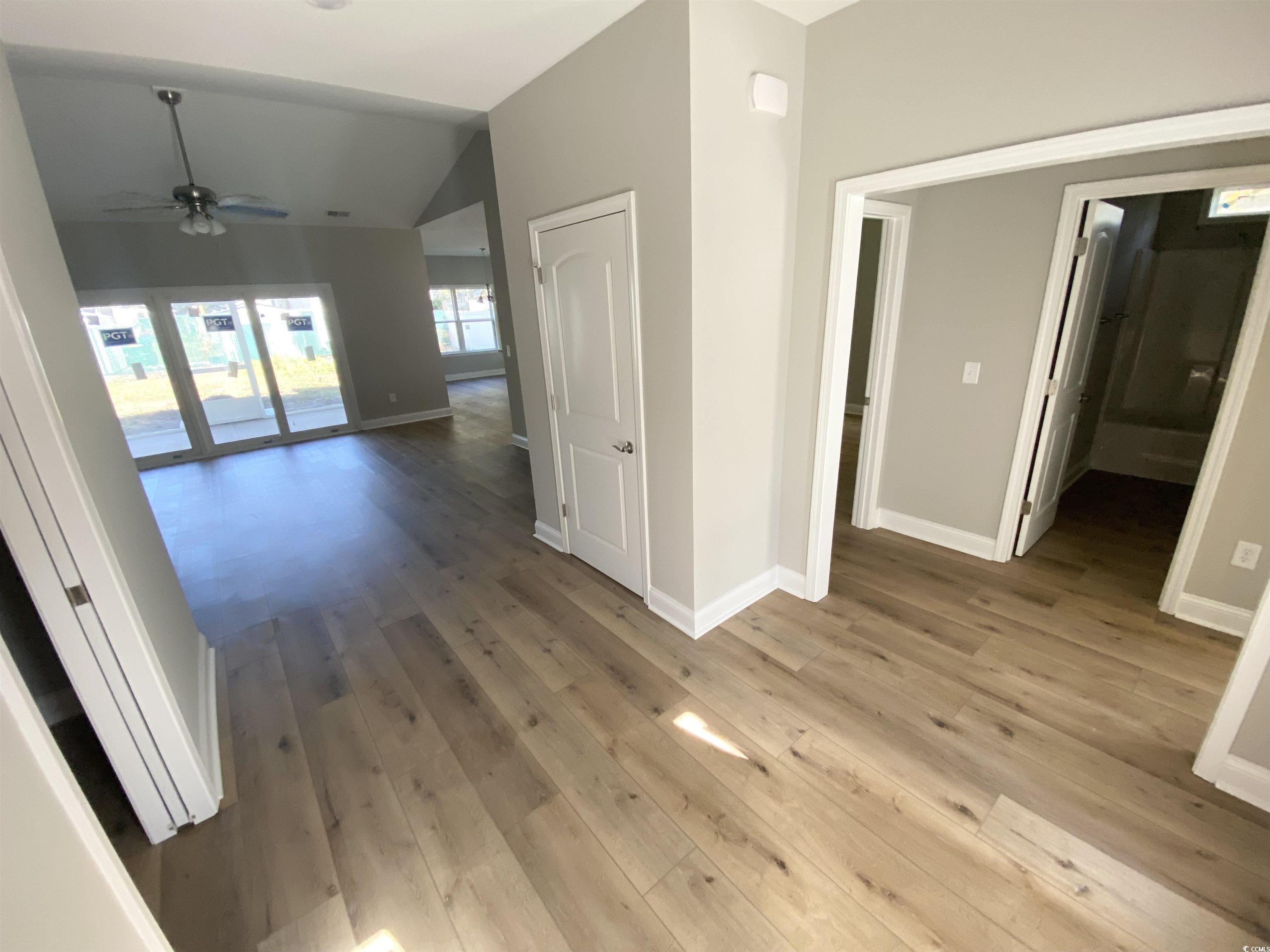 348 Jay Street Murrells Inlet, SC 29576 - Photo 16 of 29 Corridor featuring vaulted ceiling and light hardw