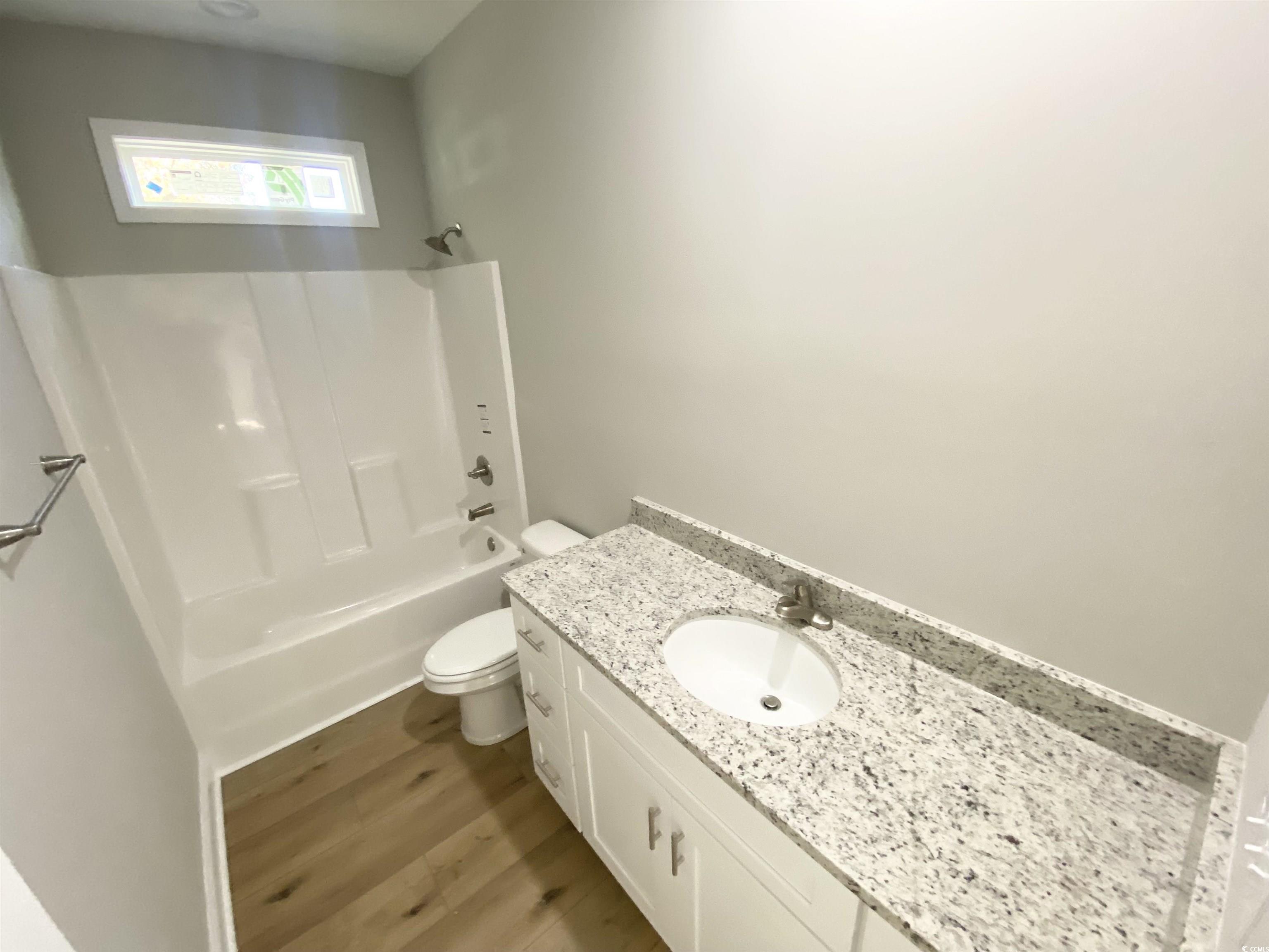 348 Jay Street Murrells Inlet, SC 29576 - Photo 25 of 29 Full bathroom featuring vanity, shower / tub combi