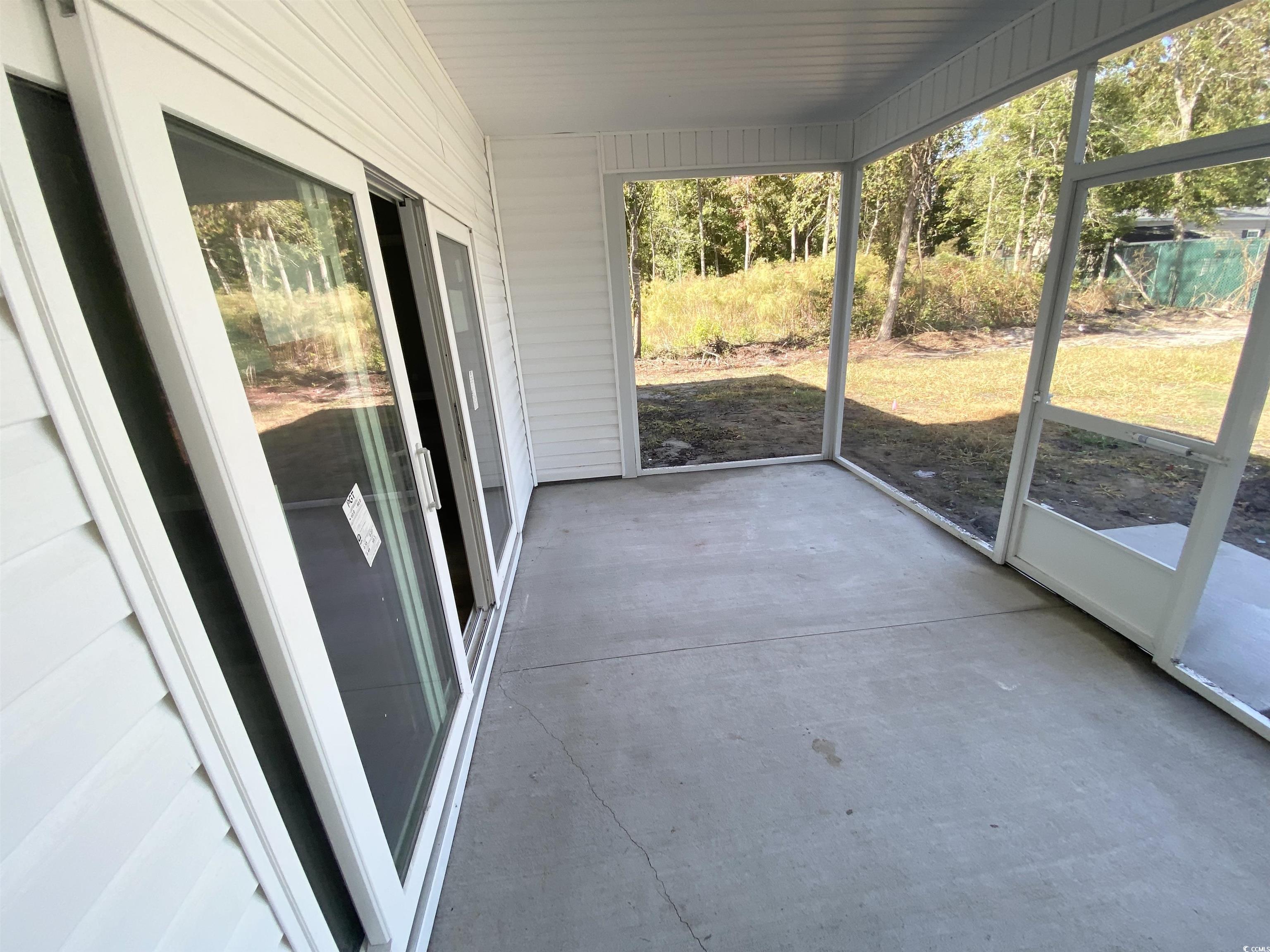 348 Jay Street Murrells Inlet, SC 29576 - Photo 27 of 29 View of unfurnished sunroom