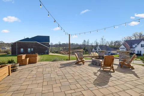 an aerial view of a house with outdoor space