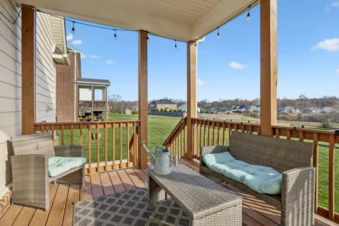 an aerial view of a pool patio patio and outdoor seating