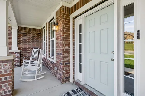 a view of balcony with a patio
