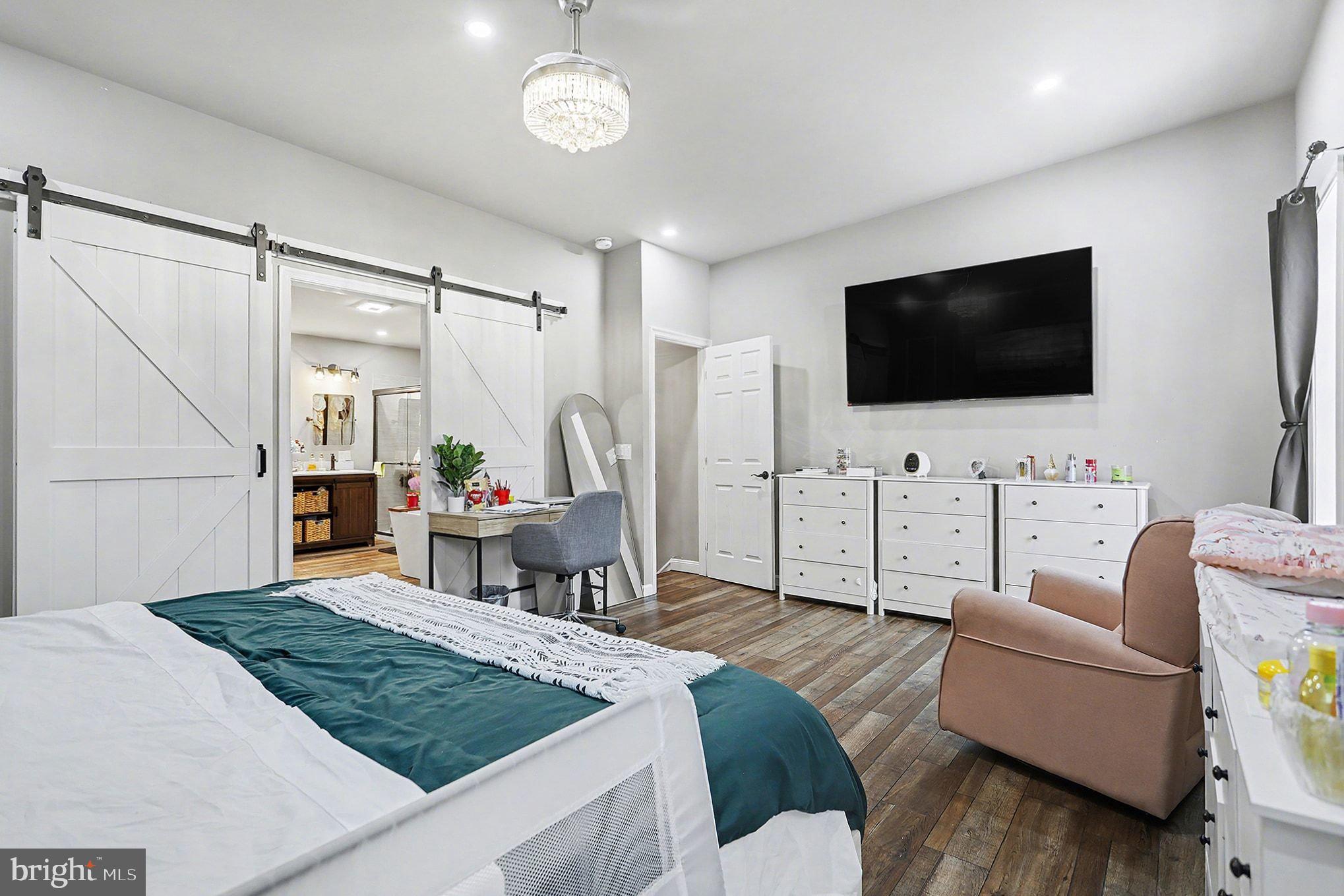 669 West Princess Street York, PA 17401 - Photo 14 of 33 a living room with furniture and a flat screen tv