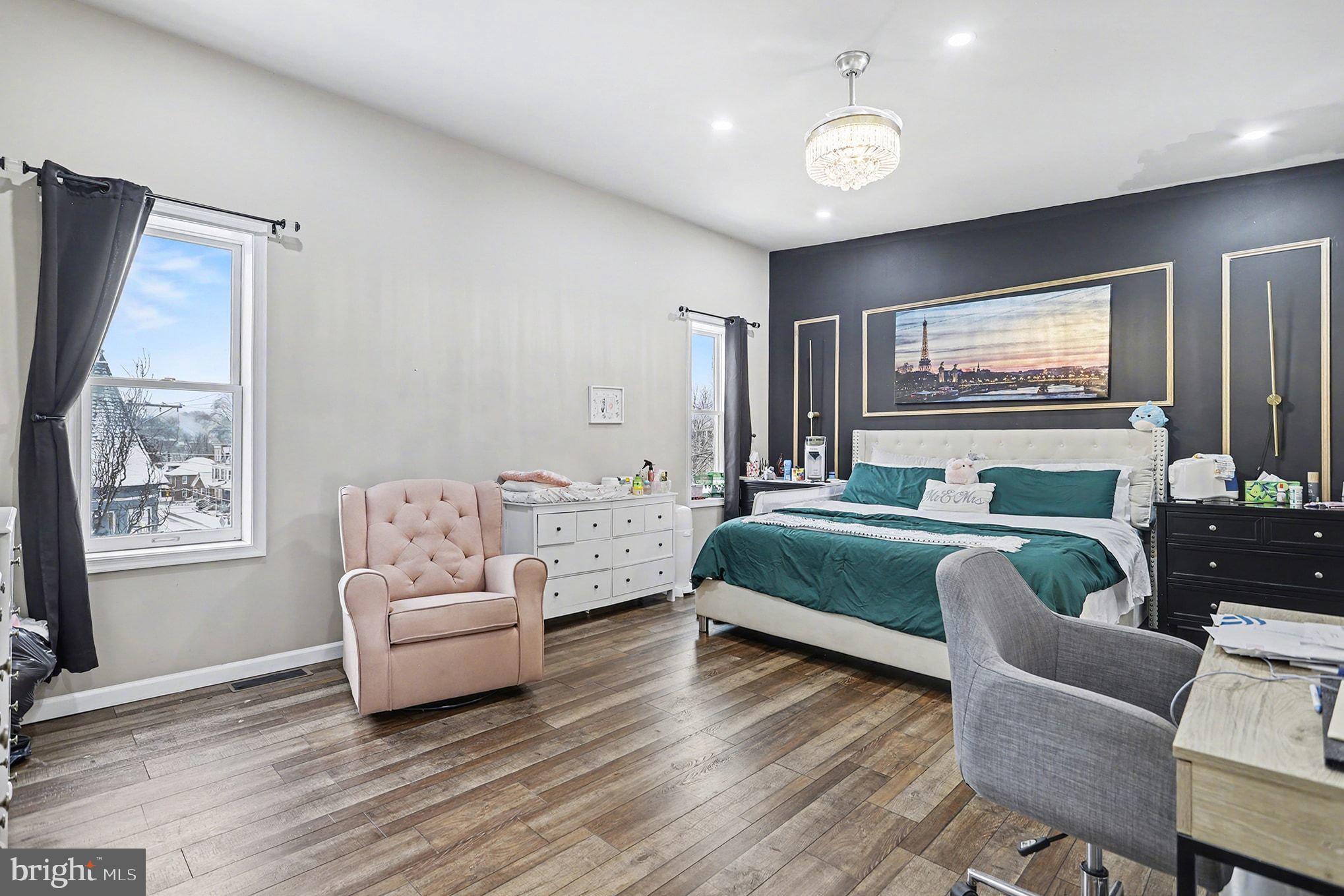 669 West Princess Street York, PA 17401 - Photo 15 of 33 a spacious bedroom with furniture and a large window