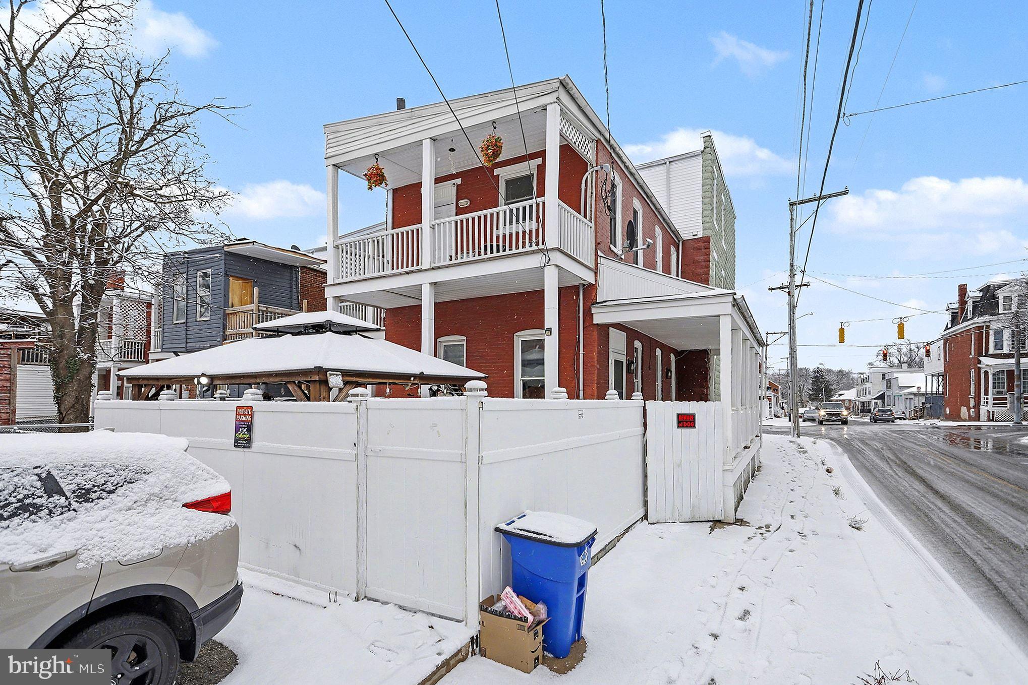669 West Princess Street York, PA 17401 - Photo 27 of 33 a front view of a building with parking space