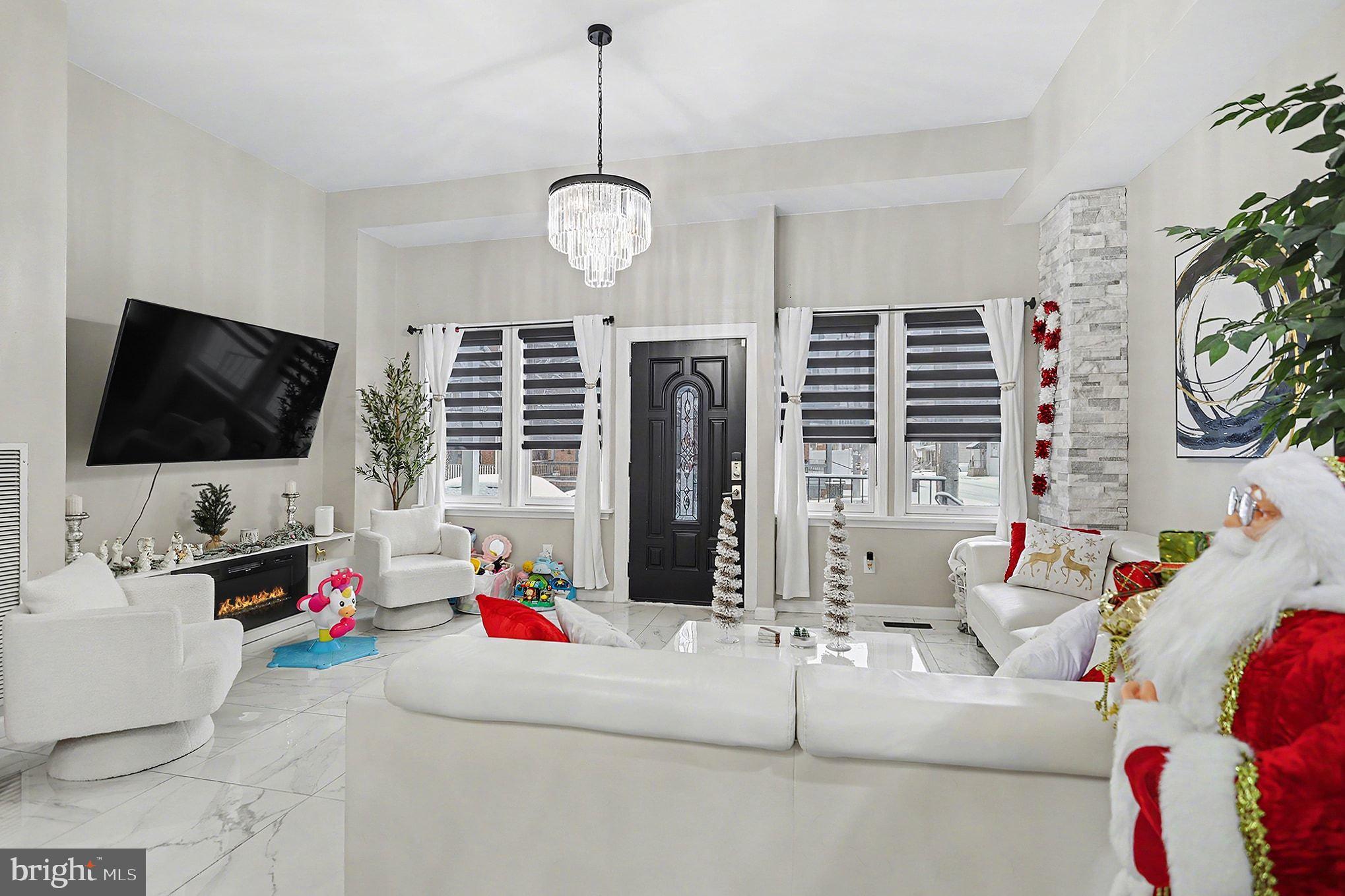 669 West Princess Street York, PA 17401 - Photo 5 of 33 a living room with furniture and a flat screen tv