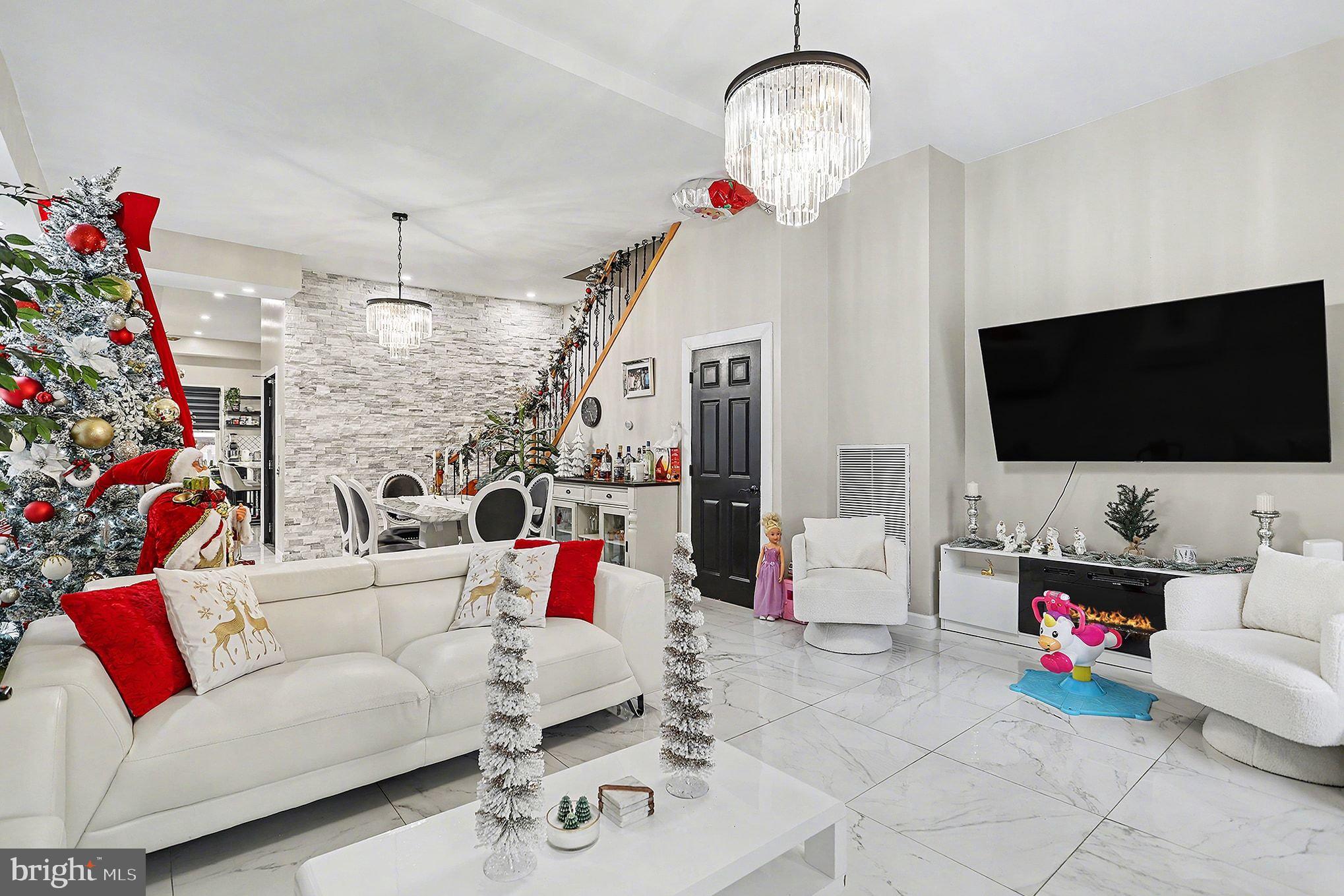 669 West Princess Street York, PA 17401 - Photo 6 of 33 a living room with furniture and a flat screen tv