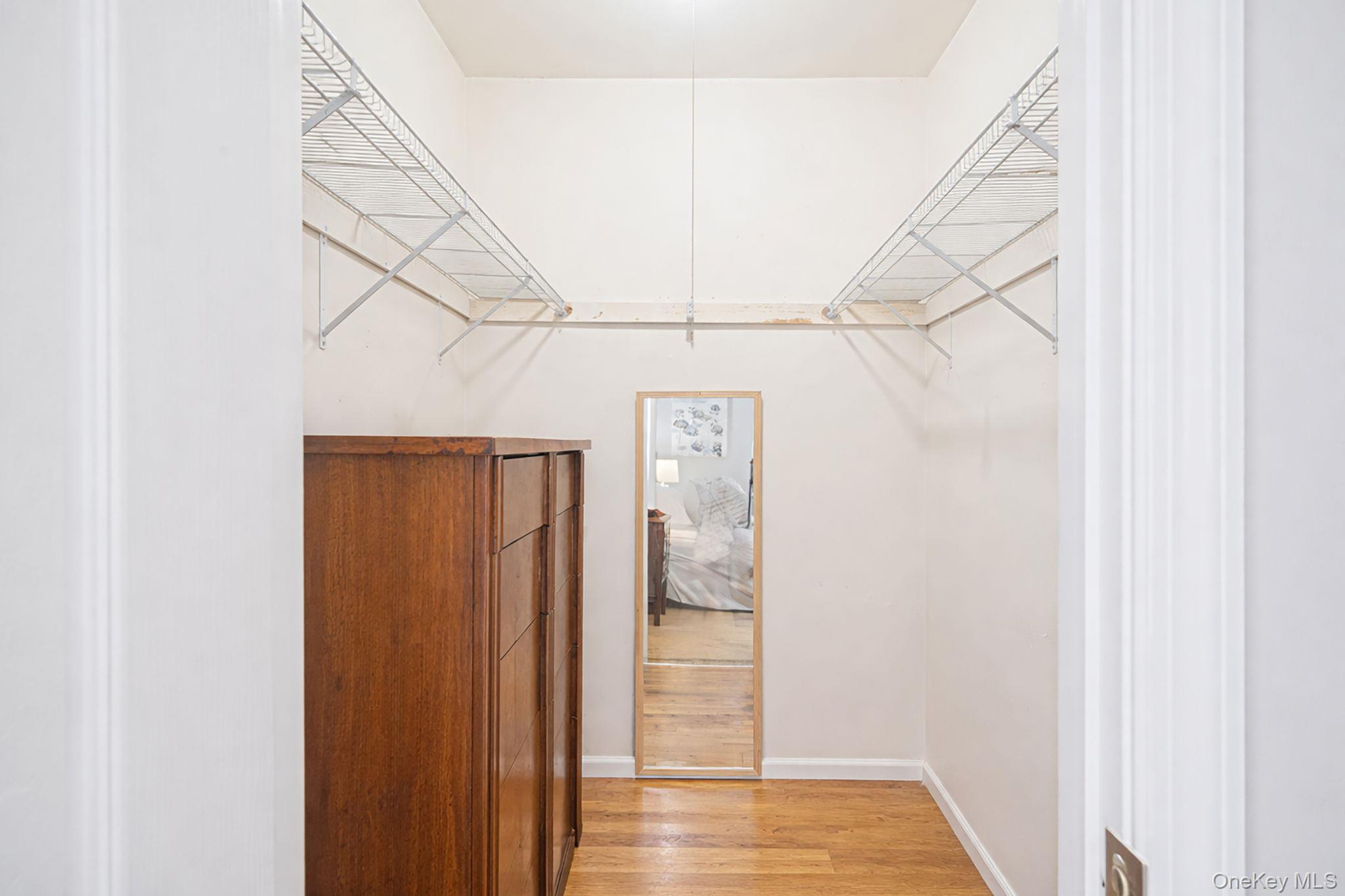 3 Meroke Lane Rocky Point, NY 11778 - Photo 18 of 43 Primary bedroom walk-in closet, access to attic