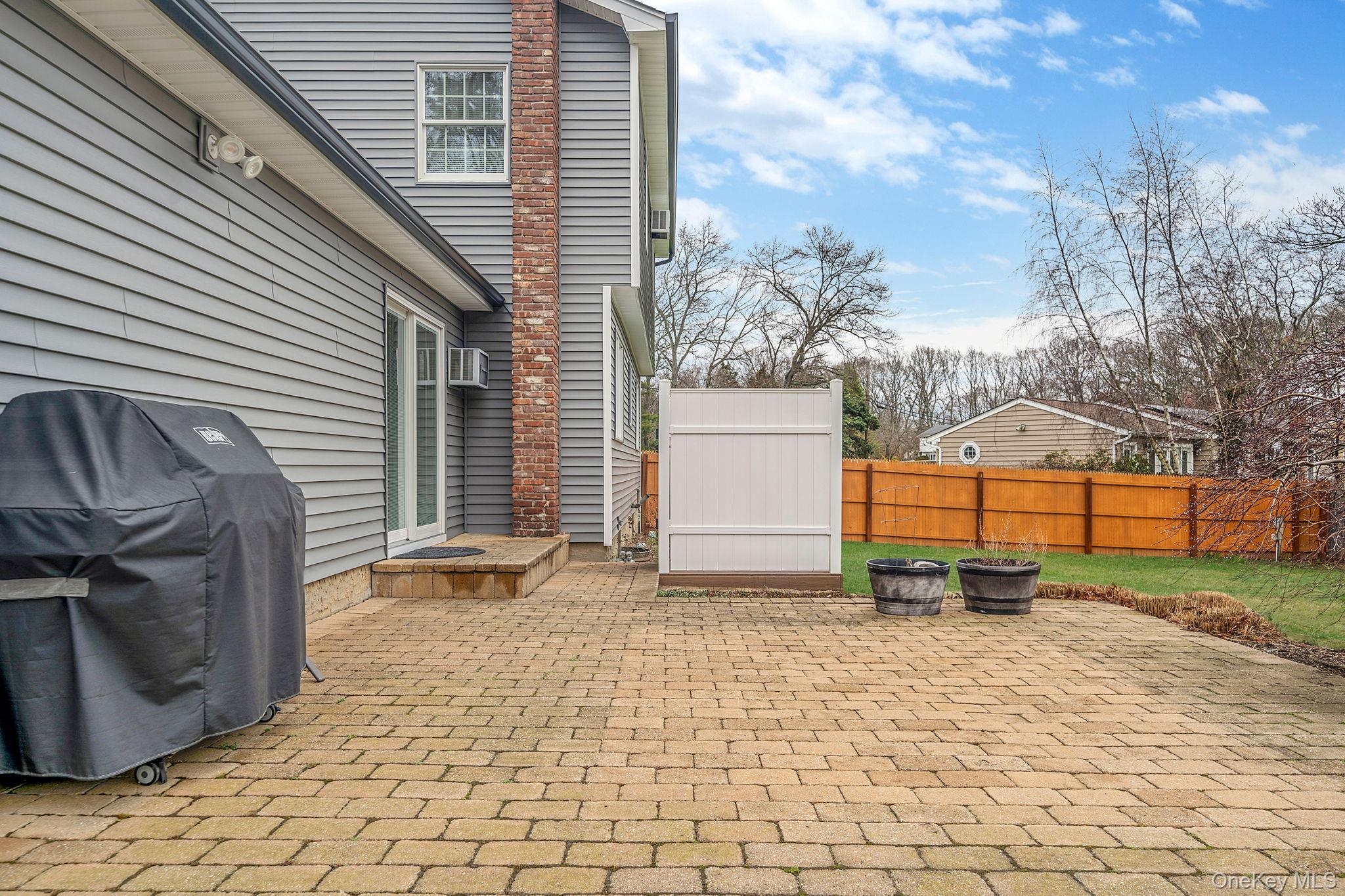 3 Meroke Lane Rocky Point, NY 11778 - Photo 33 of 43 Lovely brick patio