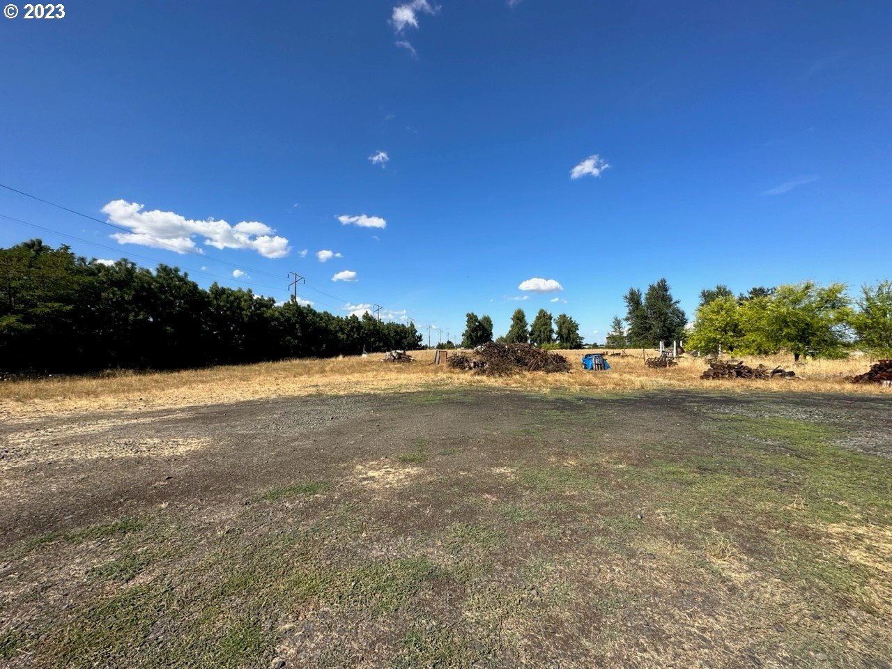 18936 Butteville Road Northeast Aurora, OR 97002 - Photo 8 of 9 a view of an ocean and a yard