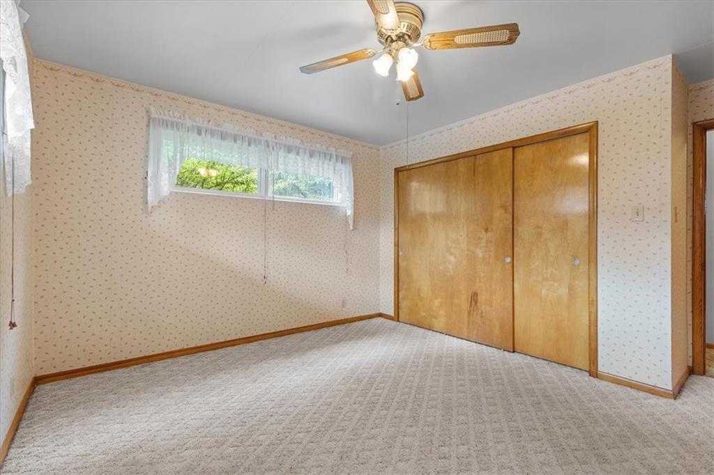 1891 Concord Drive Ambridge, PA 15003 - Photo 16 of 40 an empty room with windows and fan