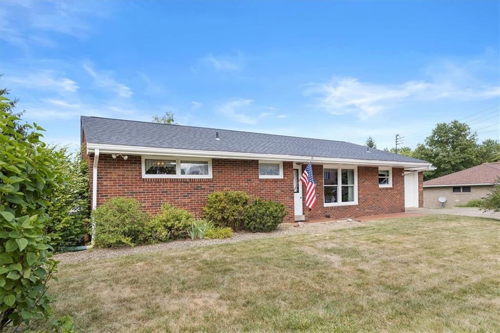 1891 Concord Drive Ambridge, PA 15003 - Photo 4 of 40 front view of a house with a yard