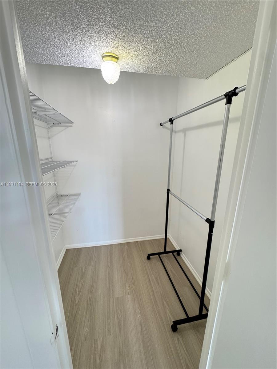 4160 Inverrary Drive, Unit 510 Lauderhill, FL 33319 - Photo 13 of 25 a view of a room with wooden floor