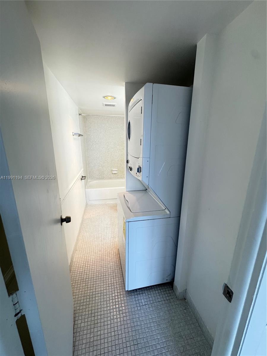 4160 Inverrary Drive, Unit 510 Lauderhill, FL 33319 - Photo 19 of 25 view of walk in closet with wooden floor