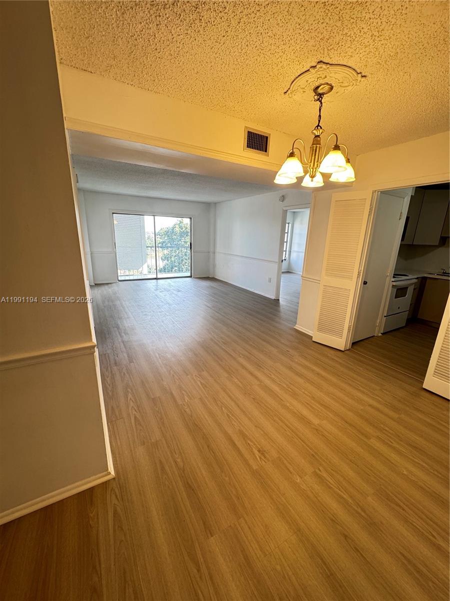 4160 Inverrary Drive, Unit 510 Lauderhill, FL 33319 - Photo 7 of 25 a view of a room with wooden floor