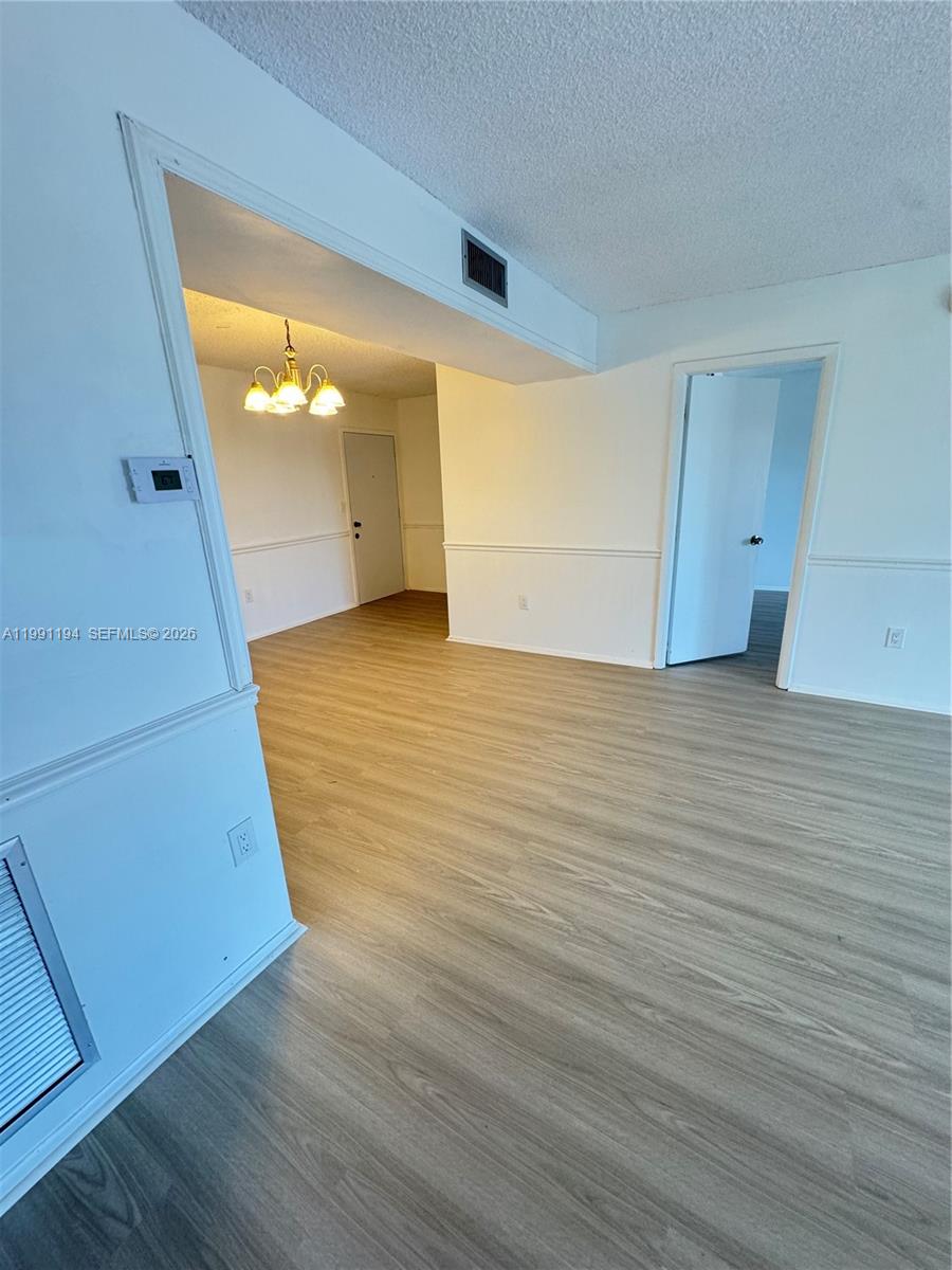 4160 Inverrary Drive, Unit 510 Lauderhill, FL 33319 - Photo 10 of 25 a view of a room with wooden floor